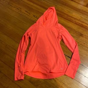 Coral colored running shirt with hood. Small, gently used, GapFit.